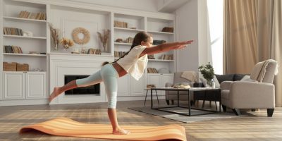 full-shot-kid-doing-yoga-home